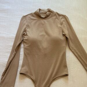 Klassy network turtle neck long sleeve bodysuit